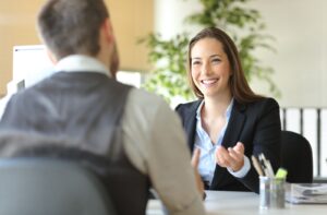 A man talking and asking advice from a female lawyer