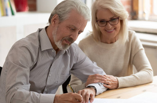 Couple signing their will and who may be their personal representative.